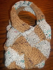 tan and white entrelac knit purse, made with recycled plastic bags